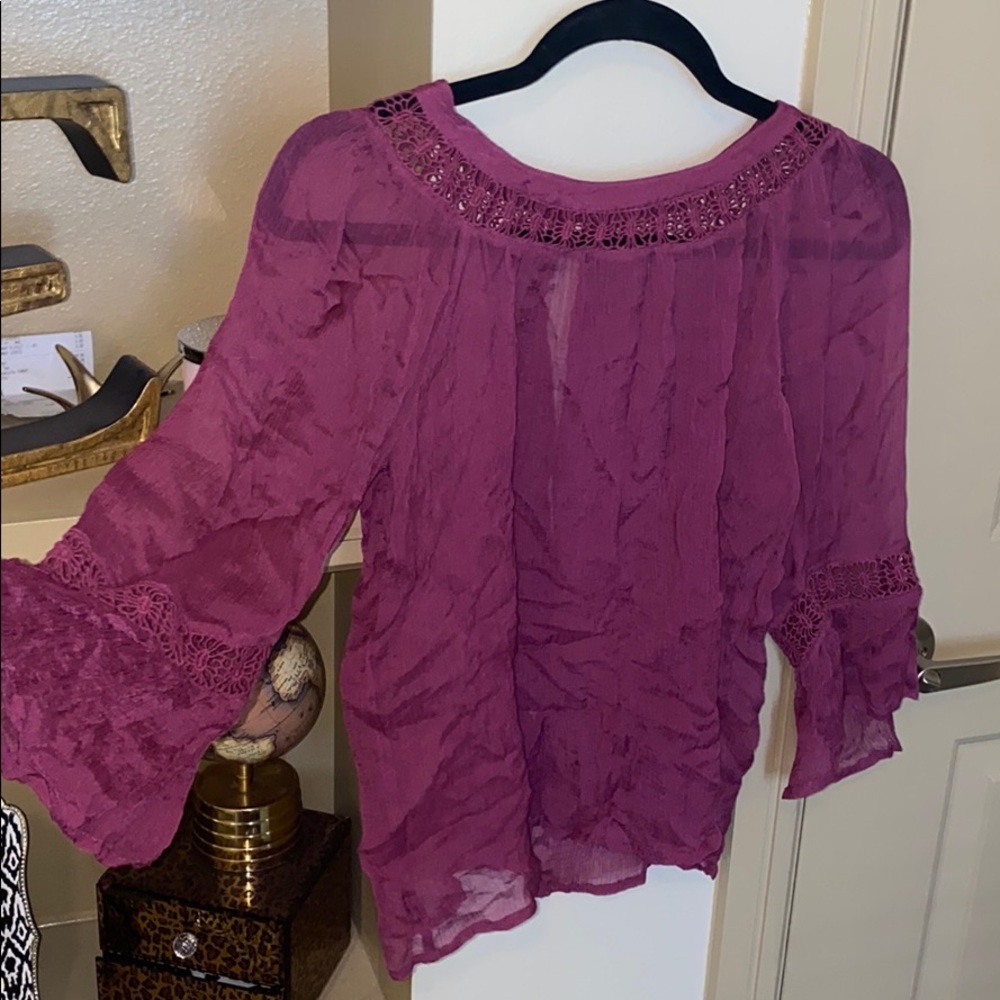 Sheer long sleeve open back top